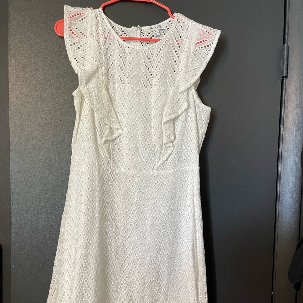 White linen dress with flutter sleeves